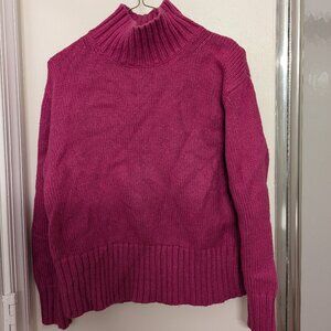 Pink turtleneck sweater